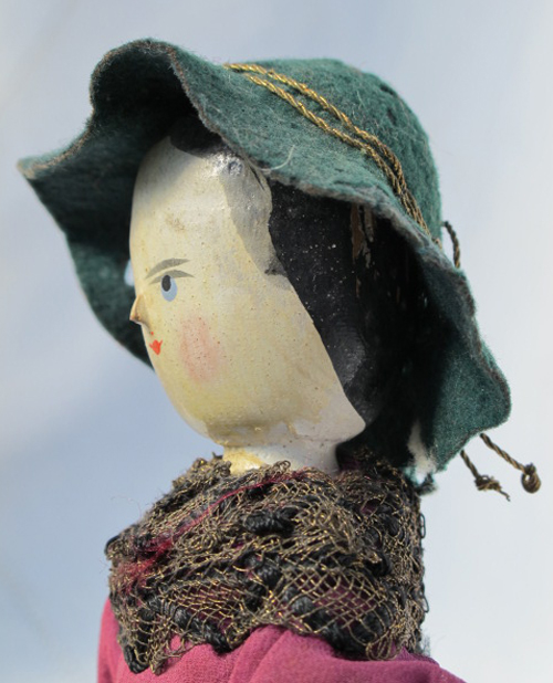 sideviewpinkdressdoll